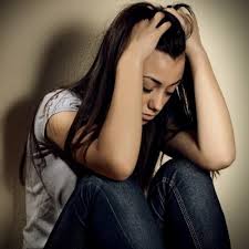 Teen holding head with Depression Social Anxiety Disorder 