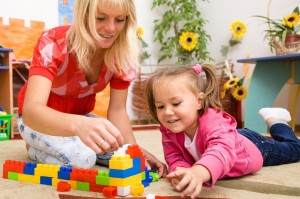 Child Psychologist playing with child in PCIT session