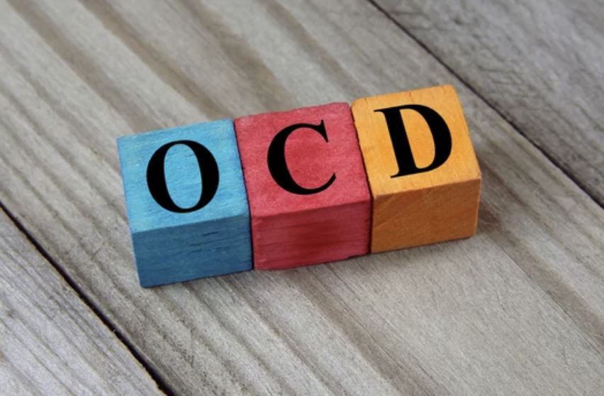 Wooden colorful blocks with abbreviation OCD