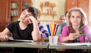 classroom with students, One student falling asleep 