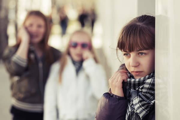 Sad bullied teen alone 