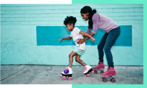 Mother and daughter riding roller skates. 
