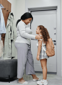 Mother and daughter getting ready for back to school