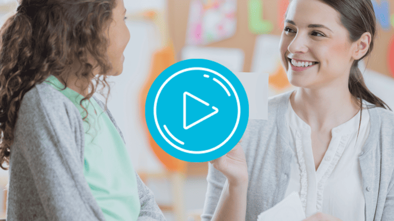 Psychologist interacting with young girl