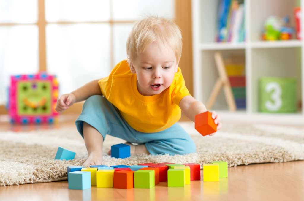 toddler playing with blocks