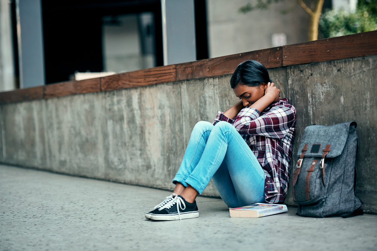 young woman feeling the pressure of college.